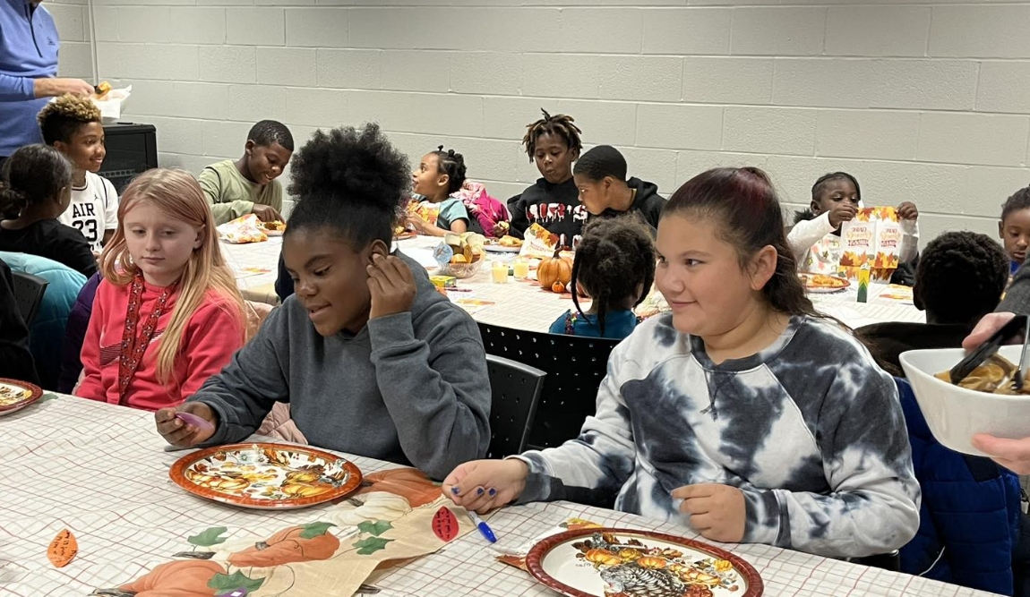 Girls Enjoying Thanksgiving Dinner